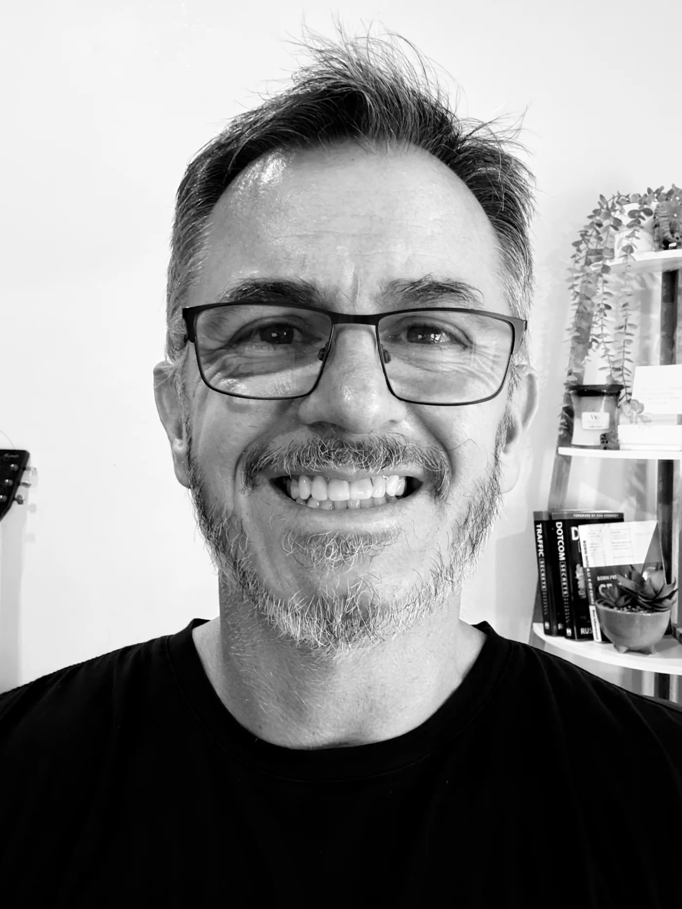 Laptop and coffee on wooden desk